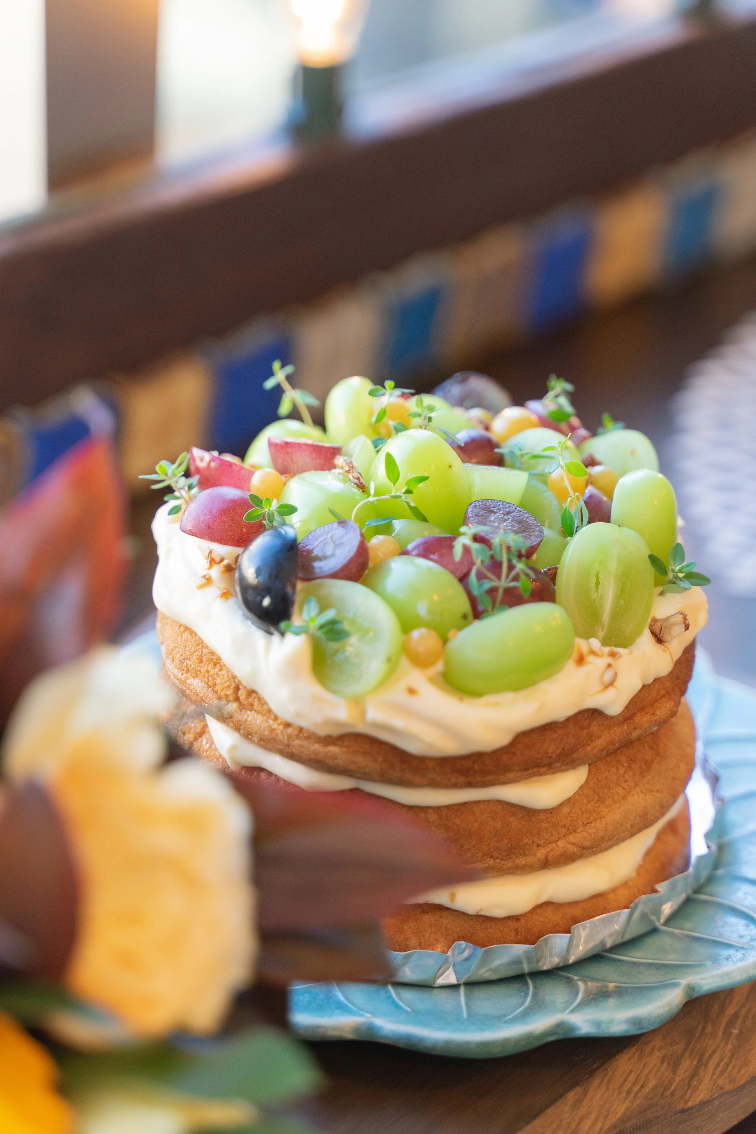 A 15 cm anniversary cake topped with Shine Muscat grapes