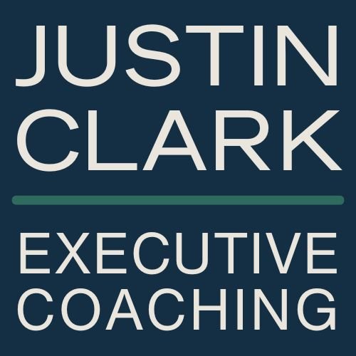 Text graphic with the words 'Justin Clark' at the top, a green line underneath, and 'Executive Coaching' at the bottom, on a dark background.
