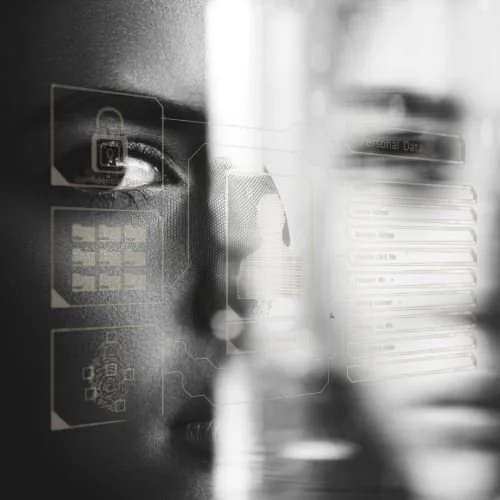Close-up of a person's face with digital interface overlay showing icons and data in a futuristic setting