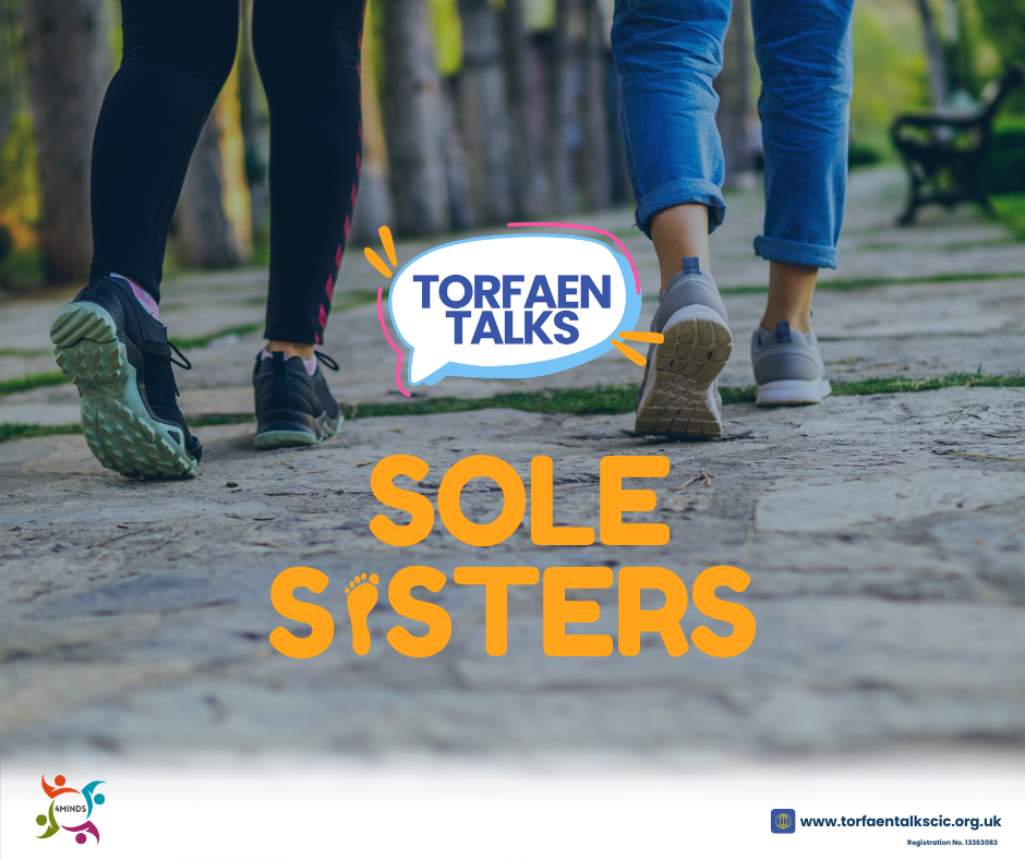 Close-up of two pairs of women’s legs walking on a stone path in a park, with the words 'Sole Sisters' and a speech bubble reading 'TORFAEN TALKS' overlaid.