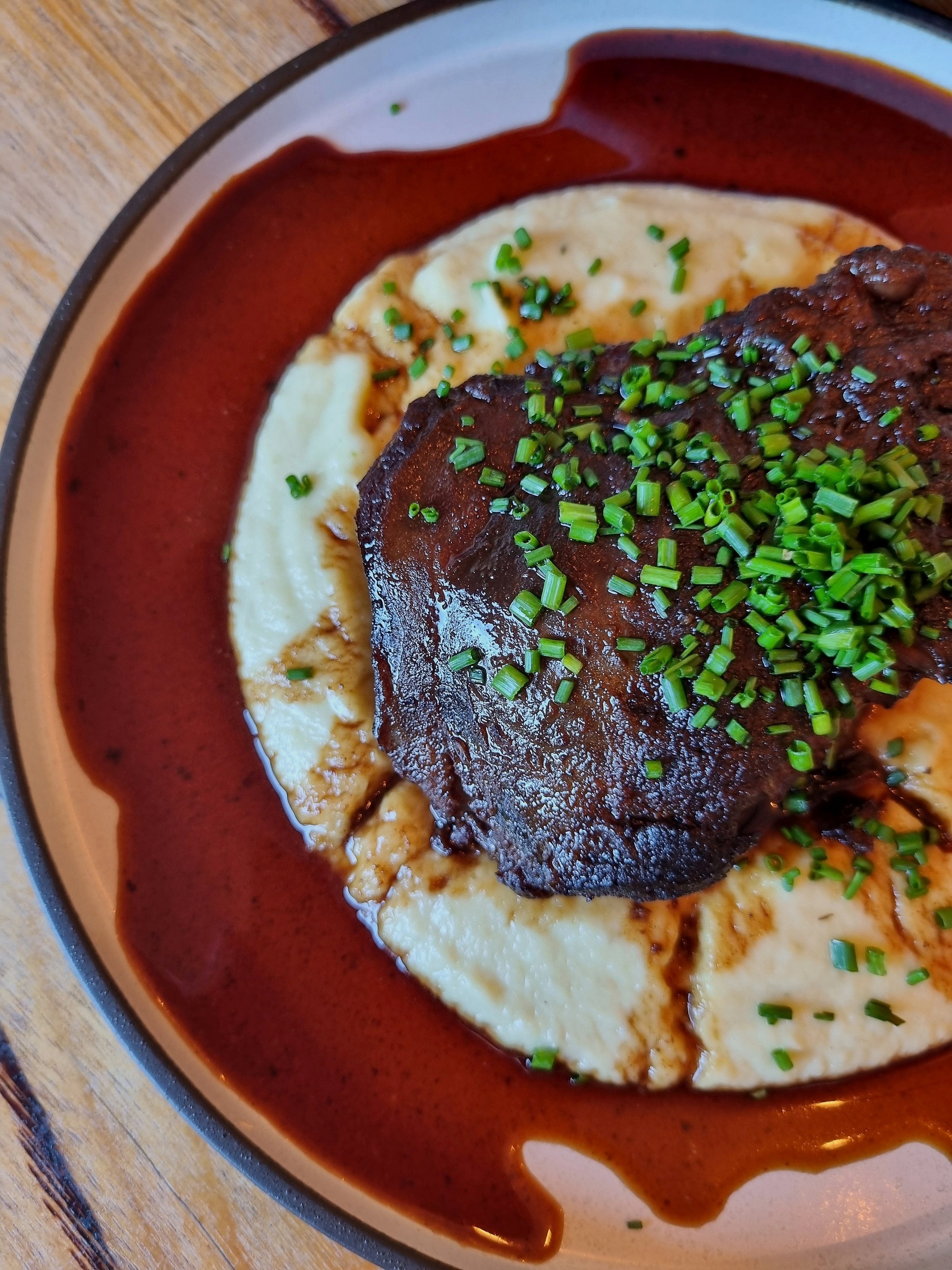 Braised Ox Cheek, slow roasted with a cauliflower Puree and red wine reduction