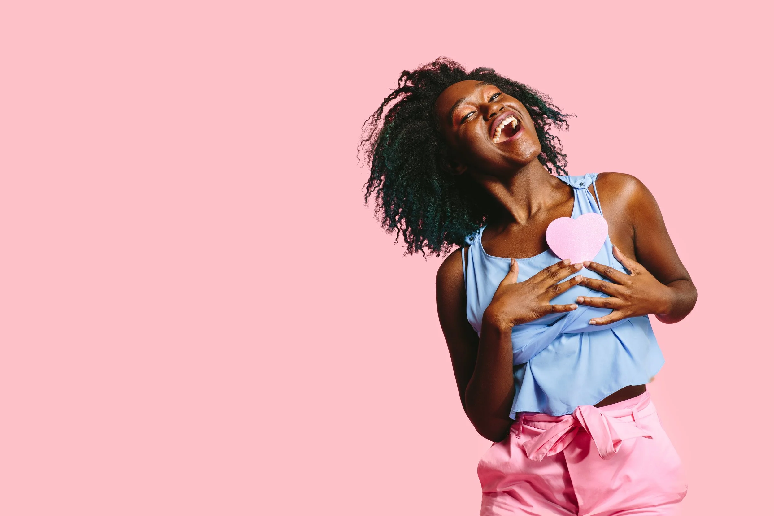 Girl holding heart for Valentines Day