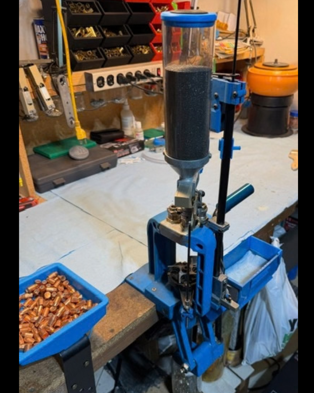 Photo of the Dillon RL 550 reloading press mounted on a workbench.