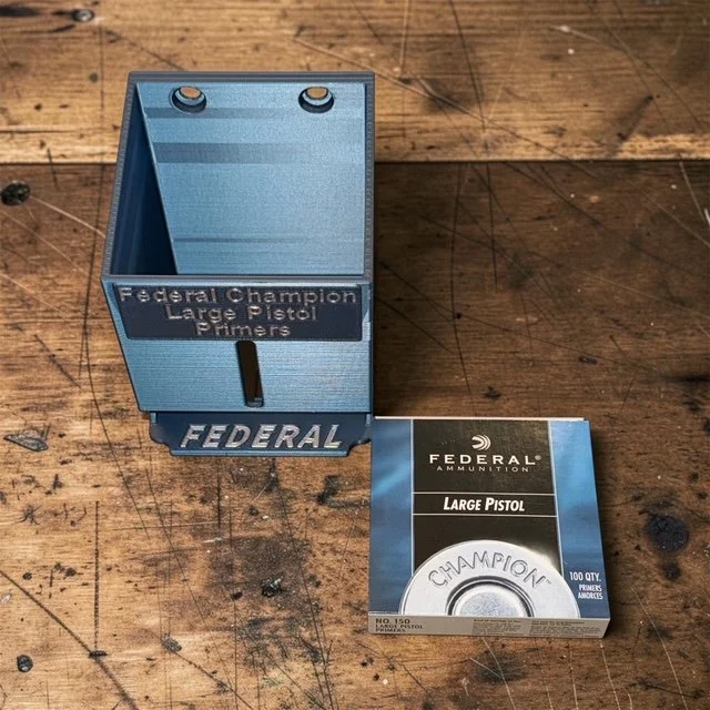 Empty Federal Champion Large Pistol Primer Pack Organizer showing five‑pack capacity and top‑load design.