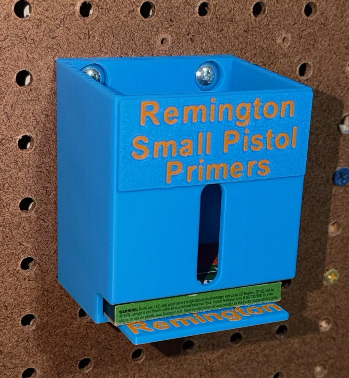 Remington small pistol primer pack organizer holding a primer pack, waiting to dispense it.