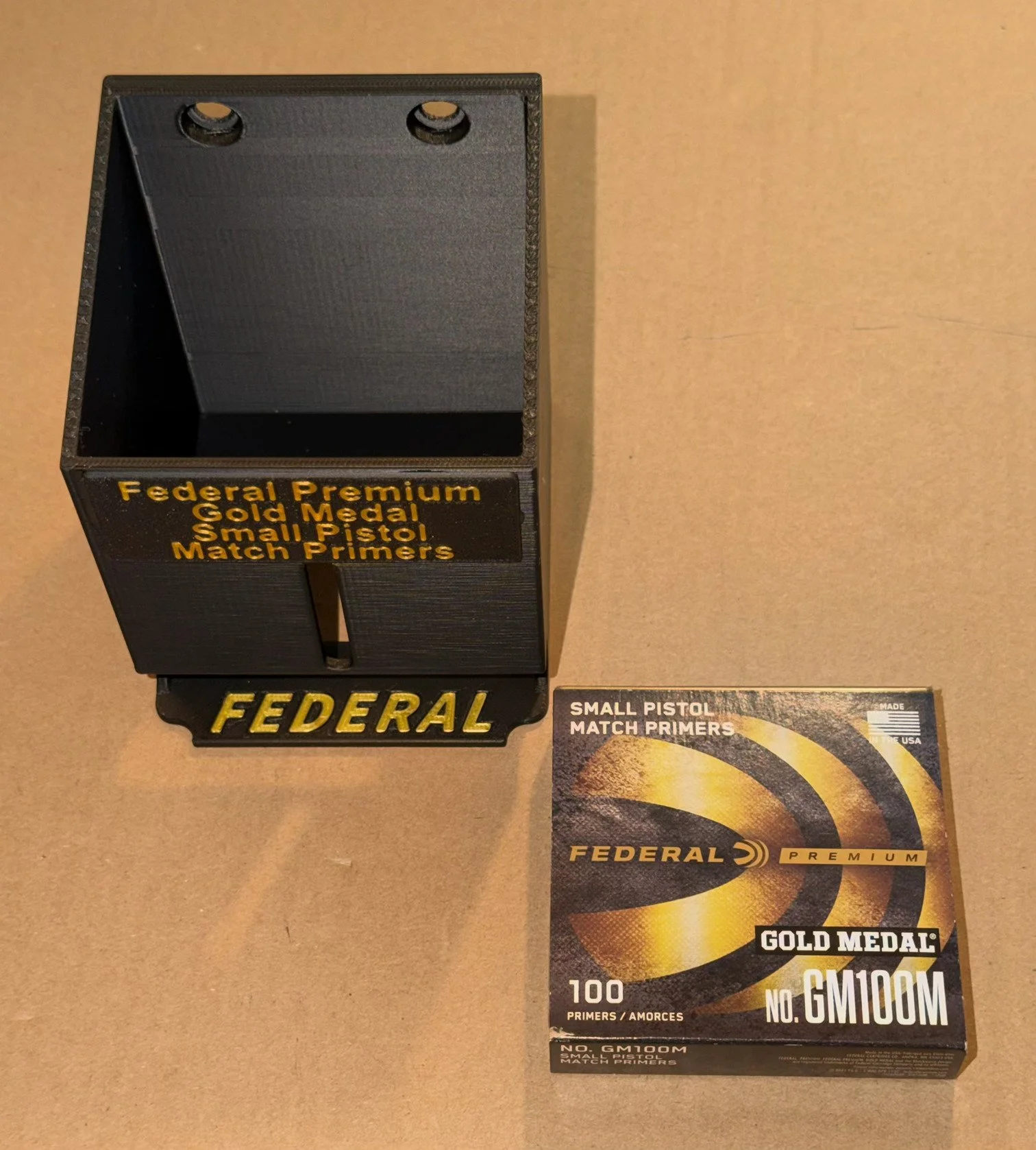Empty small pistol match primer pack organizer showing five‑pack capacity.