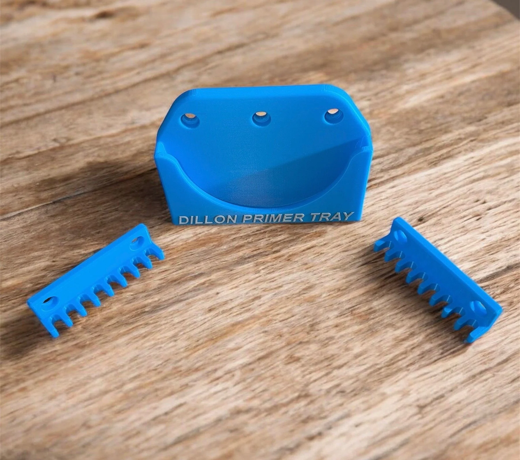 Empty primer tray and pickup tube holders, highlighting the shape and mounting design of each component.