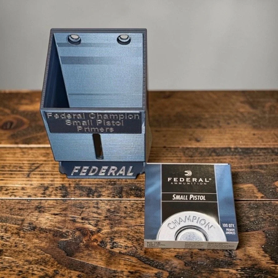 Empty Federal Champion Small Pistol Primer Pack Organizer showing five‑pack capacity and top‑load design.