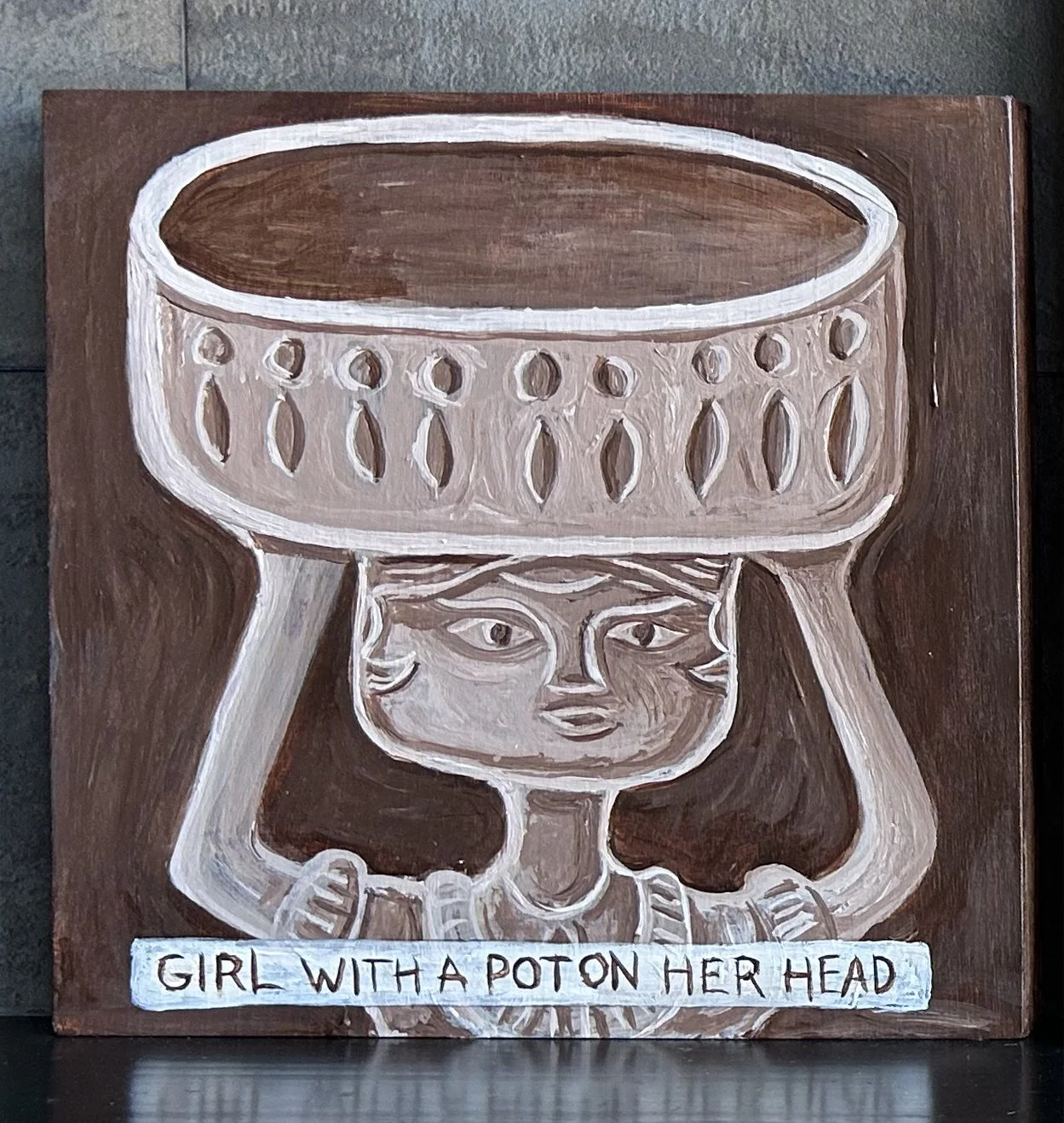 Girl with a Pot on Her Head