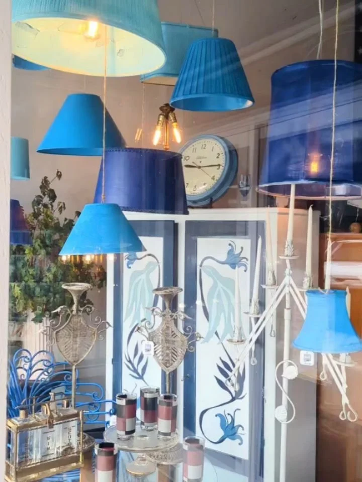 We went big with blue in our fresh shop windows 💙

It's so much fun to dream up creative reuse ideas with vintage items from our storage unit. We had accumulated a large collection of damaged lamp shades, so voila....a spritz of blue and a new life.