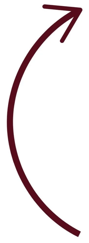 A curved arrow pointing upwards and to the right, in a dark red color.