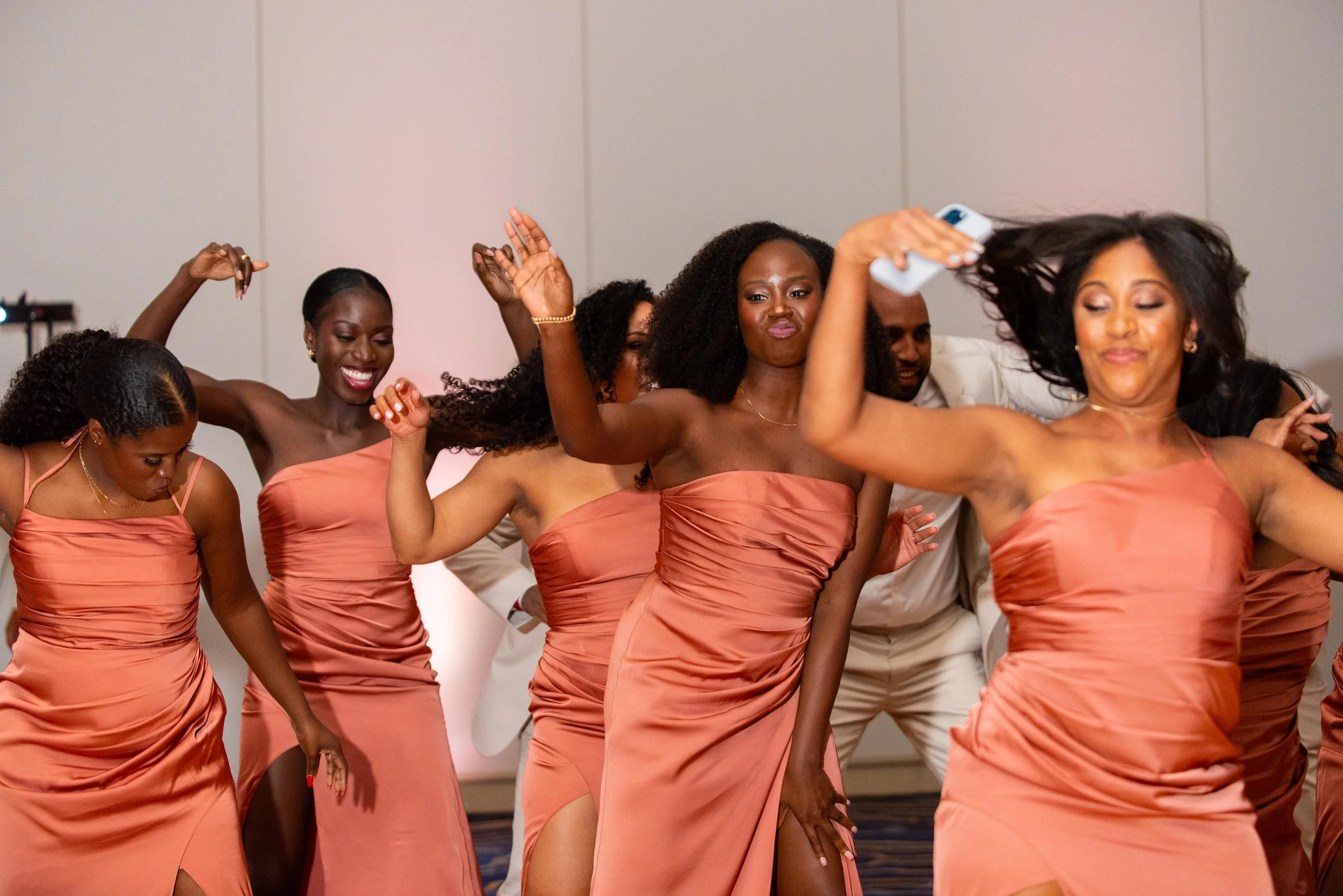 virginia-beach-beach-wedding-bridesmaids-dancing.jpg