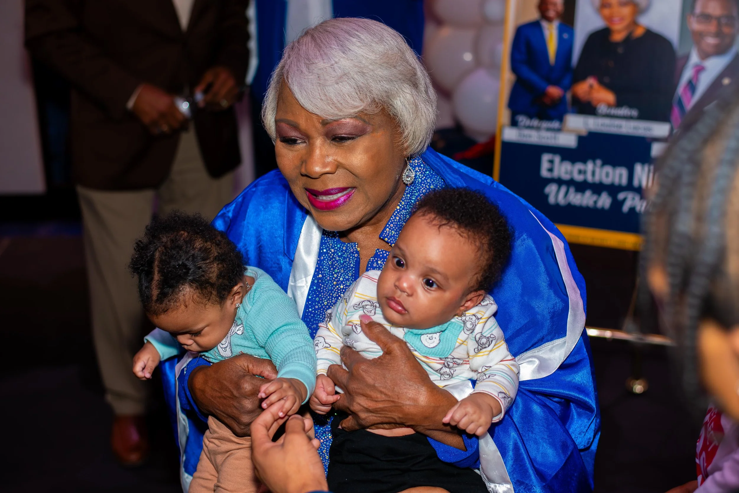 louise-lucas-holding-babies-election-night.jpg