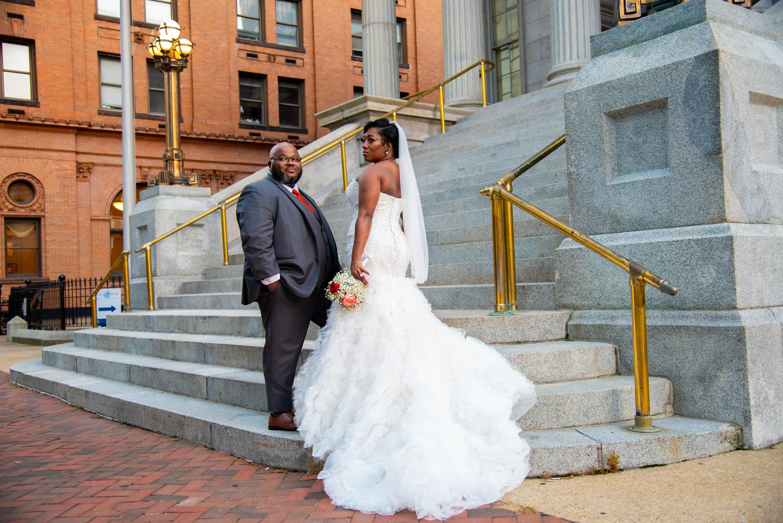 Couple standing in front of World Trade Center in Norfolk va