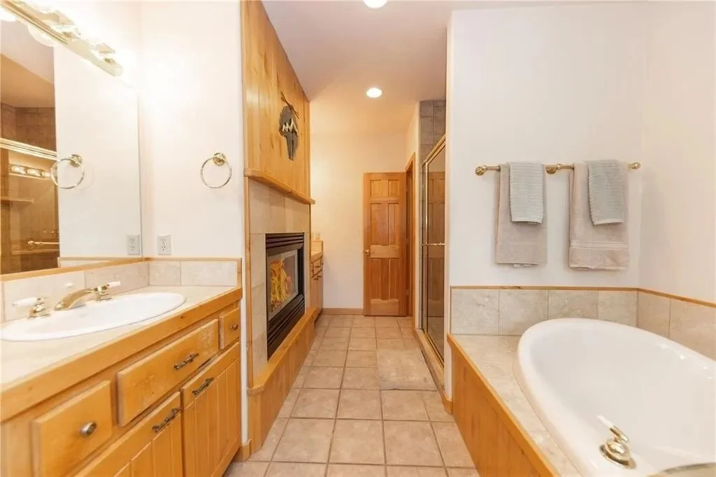 Primary bath with fireplace