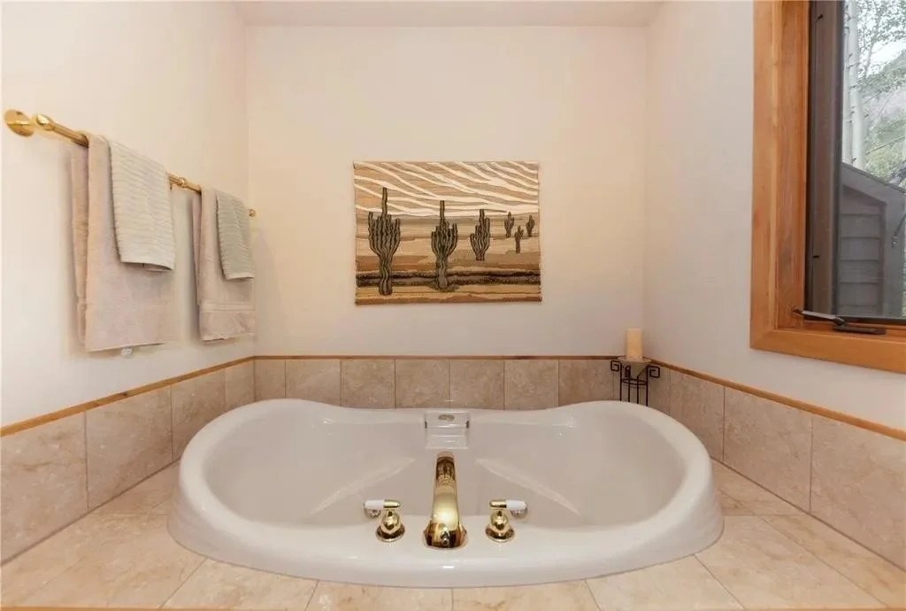 Primary bath soaking tub