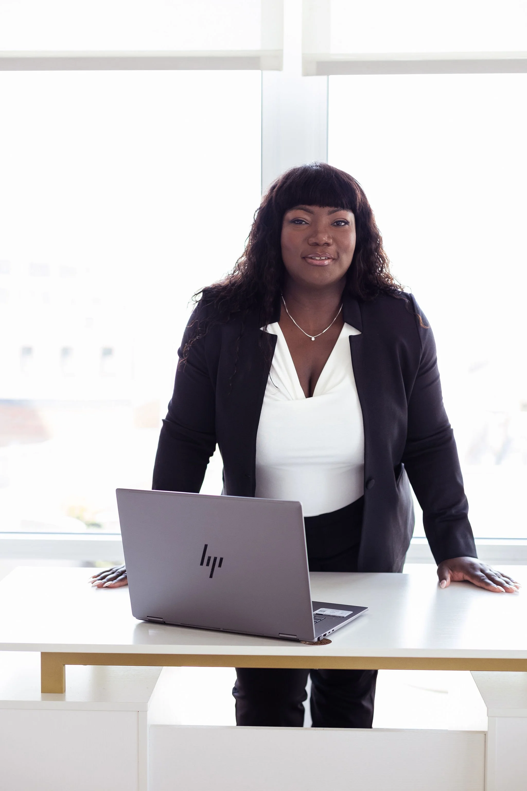 Semone Ophelia leading operational execution for founders and executive teams in a modern workspace