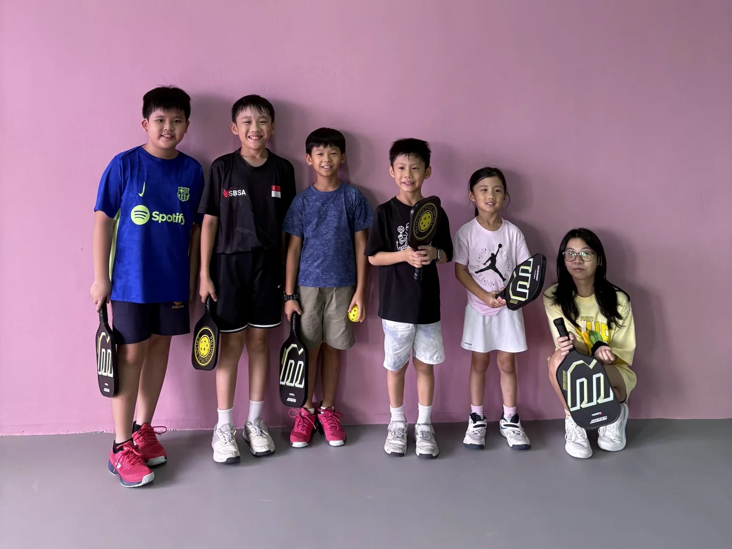 Young children learning pickleball at Play! Pickle