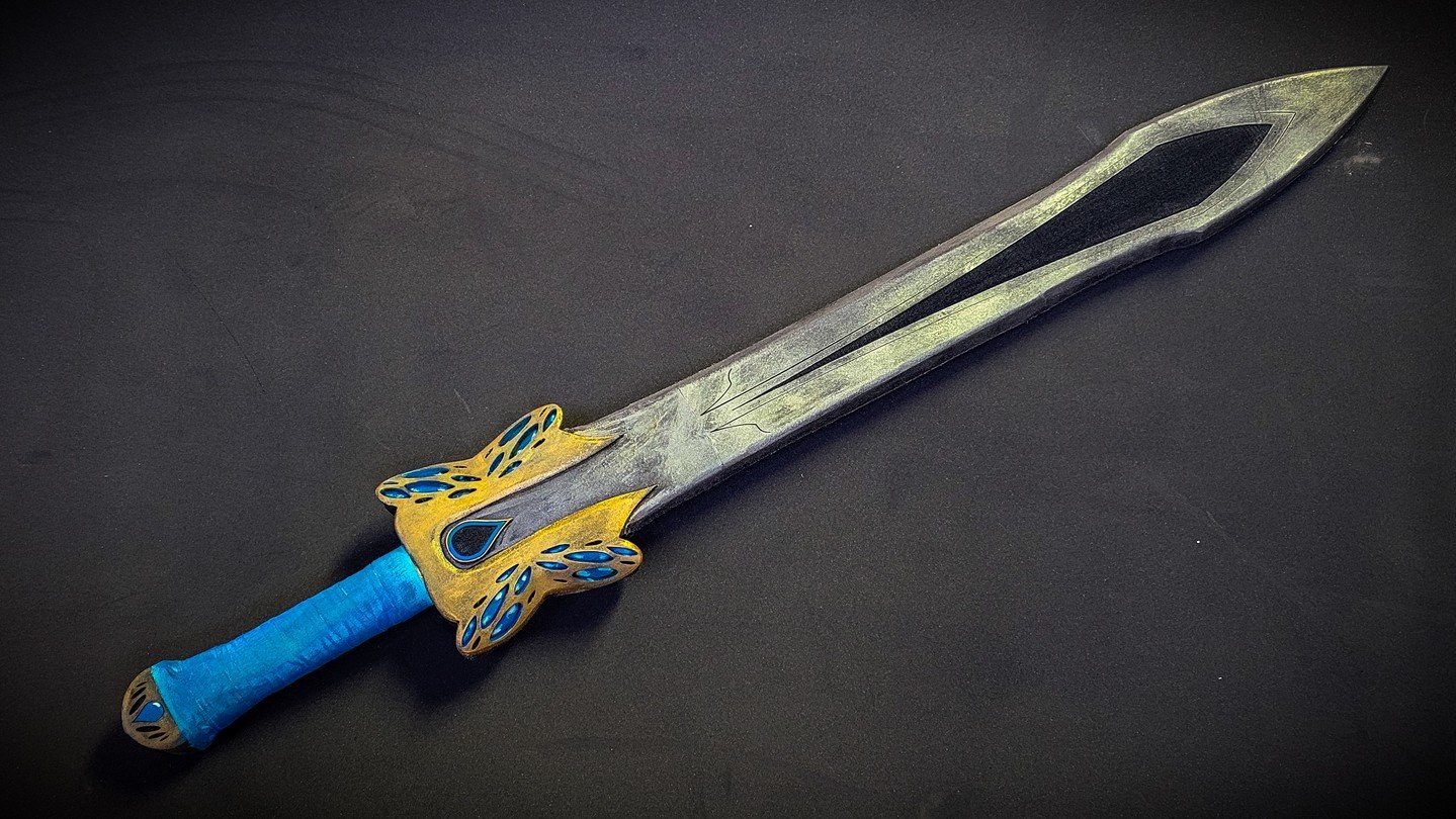 Never underestimate the fae, especially if they're on that butterfly fae-deal kind'a vibe. This prop saw several venues of LARP events in California and was a blast to make. Vibrant color and unique hilt design really got this thing together!

#LARPP