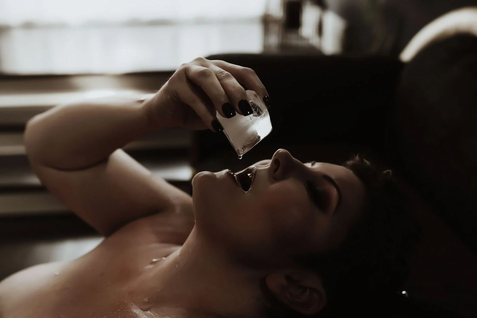 Woman sipping syrup from a shot glass in moody window light, Sticky Sweet add-on set in Nashville, TN