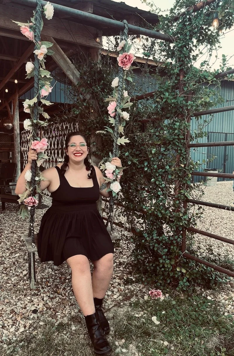 Woman on swing at Austin Texas women’s festival