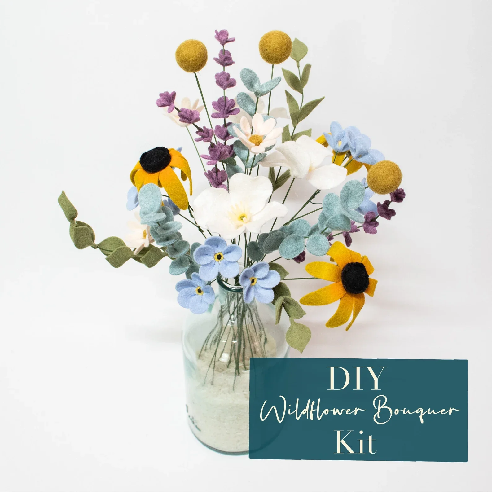 a diy bouquet of felt flowers in a vase.
