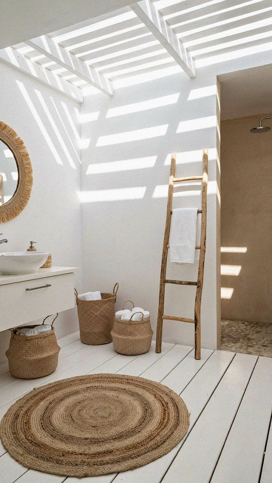 a small coastal modern and minimalist bathroom with soft textures and colors.