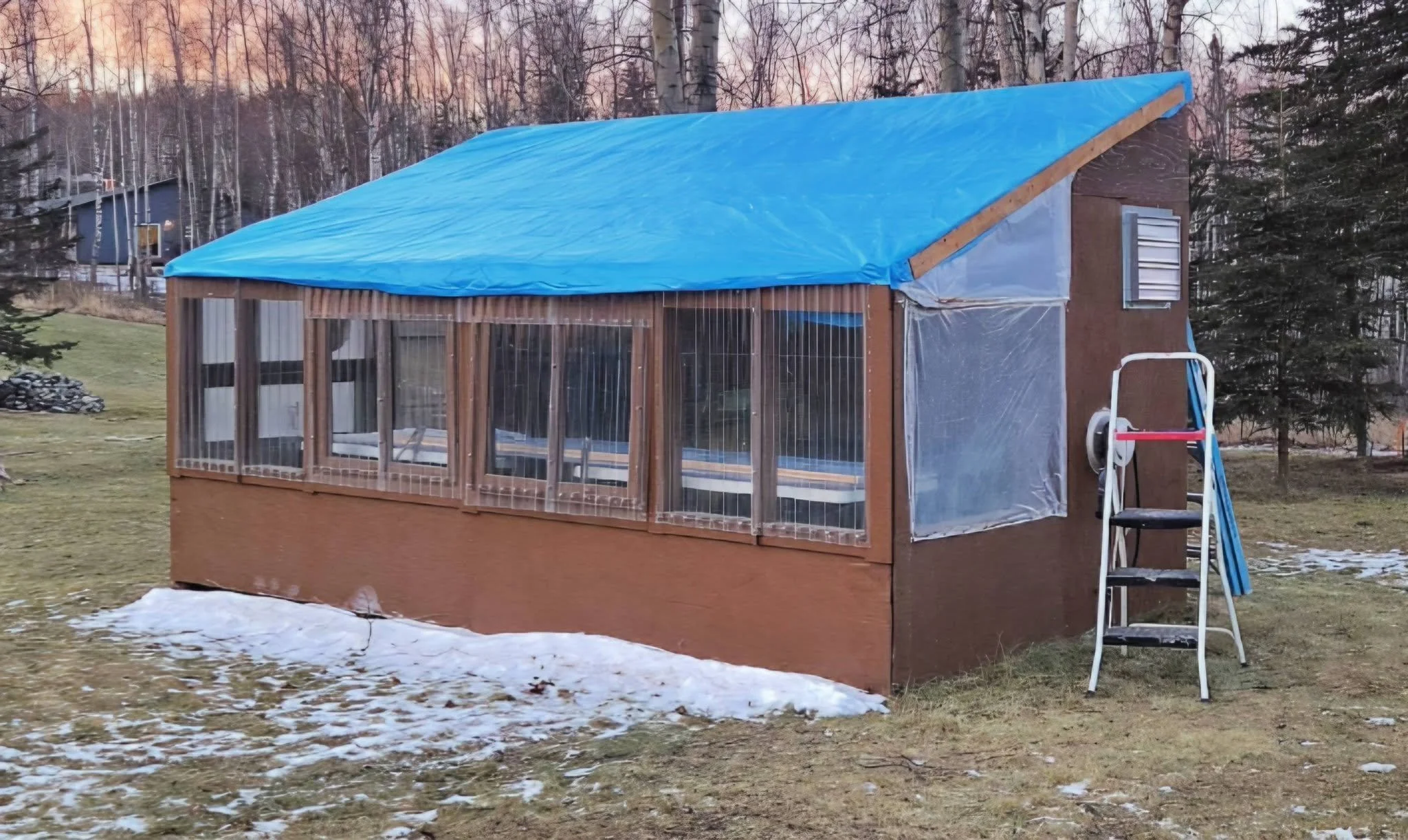Greenhouse Blue Tarp Repair.jpg