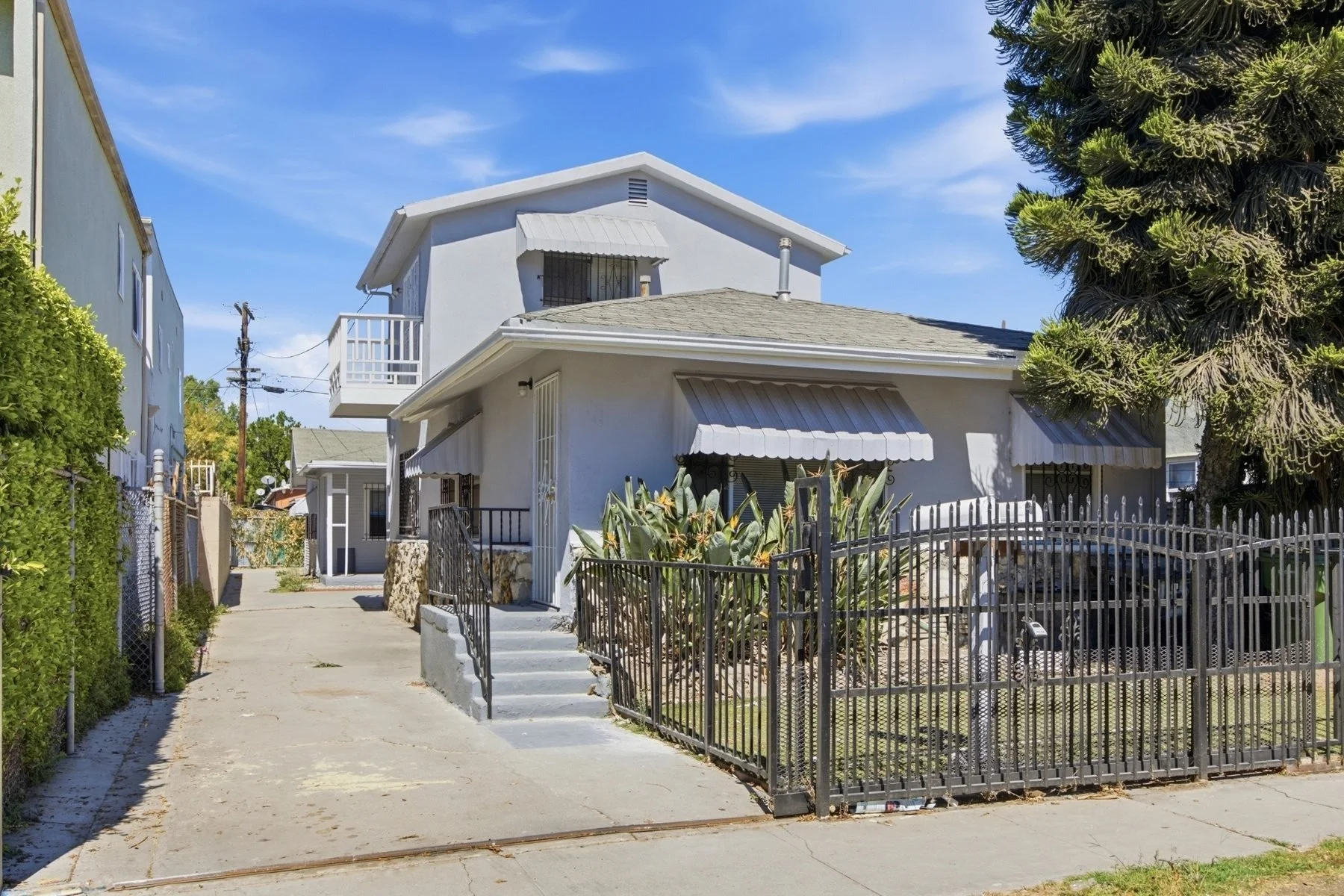 113-e-95th-st-duplex-front-elevation-los-angeles.jpg