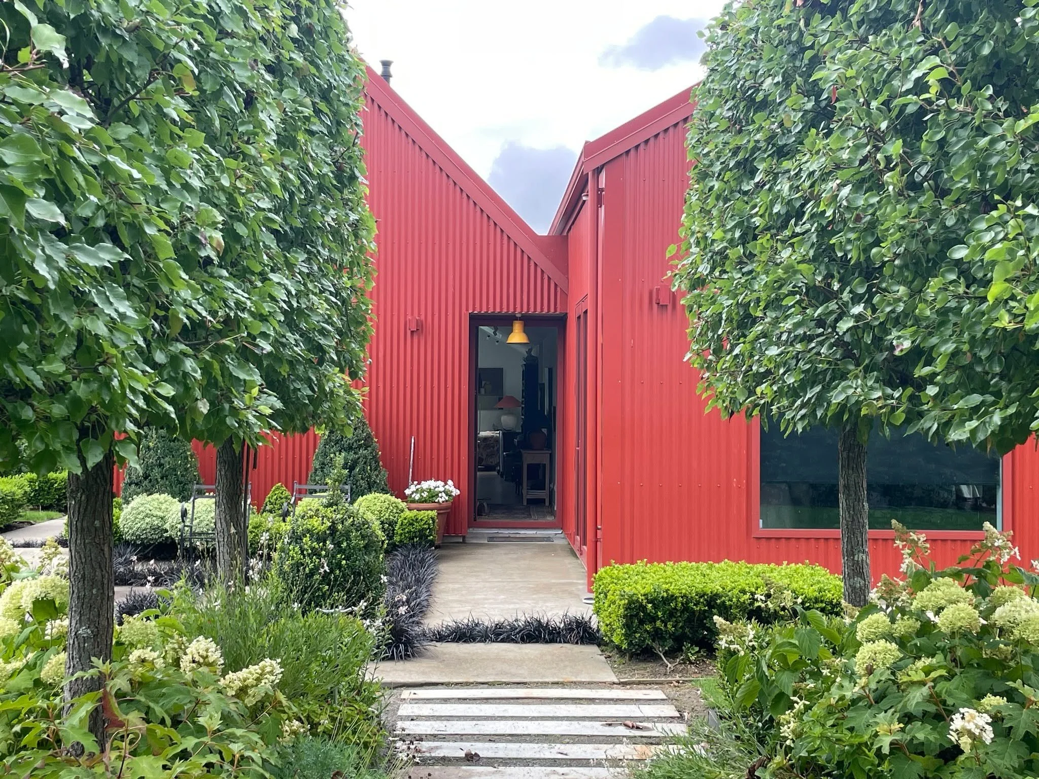 Red Sheds
⭐⭐⭐⭐⭐ Garden of National Significance
Structure, topiary, pleached hedges and a ha-ha &mdash; Red Sheds is a young Wairarapa garden with a very clear idea of what it wants to be. Open by appointment.

#newzealandgardenstrust #redsheds #wair