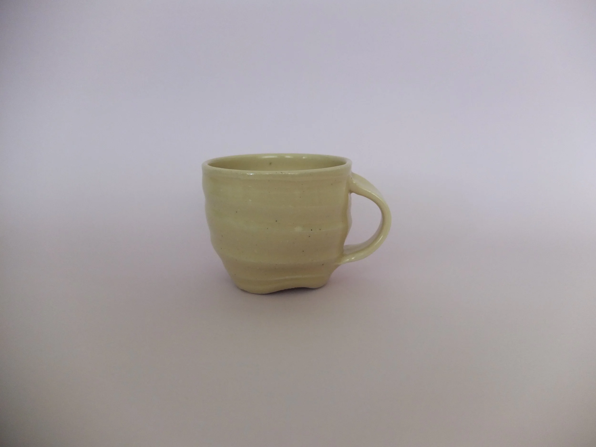 'soft swirl' mug in pastel orange