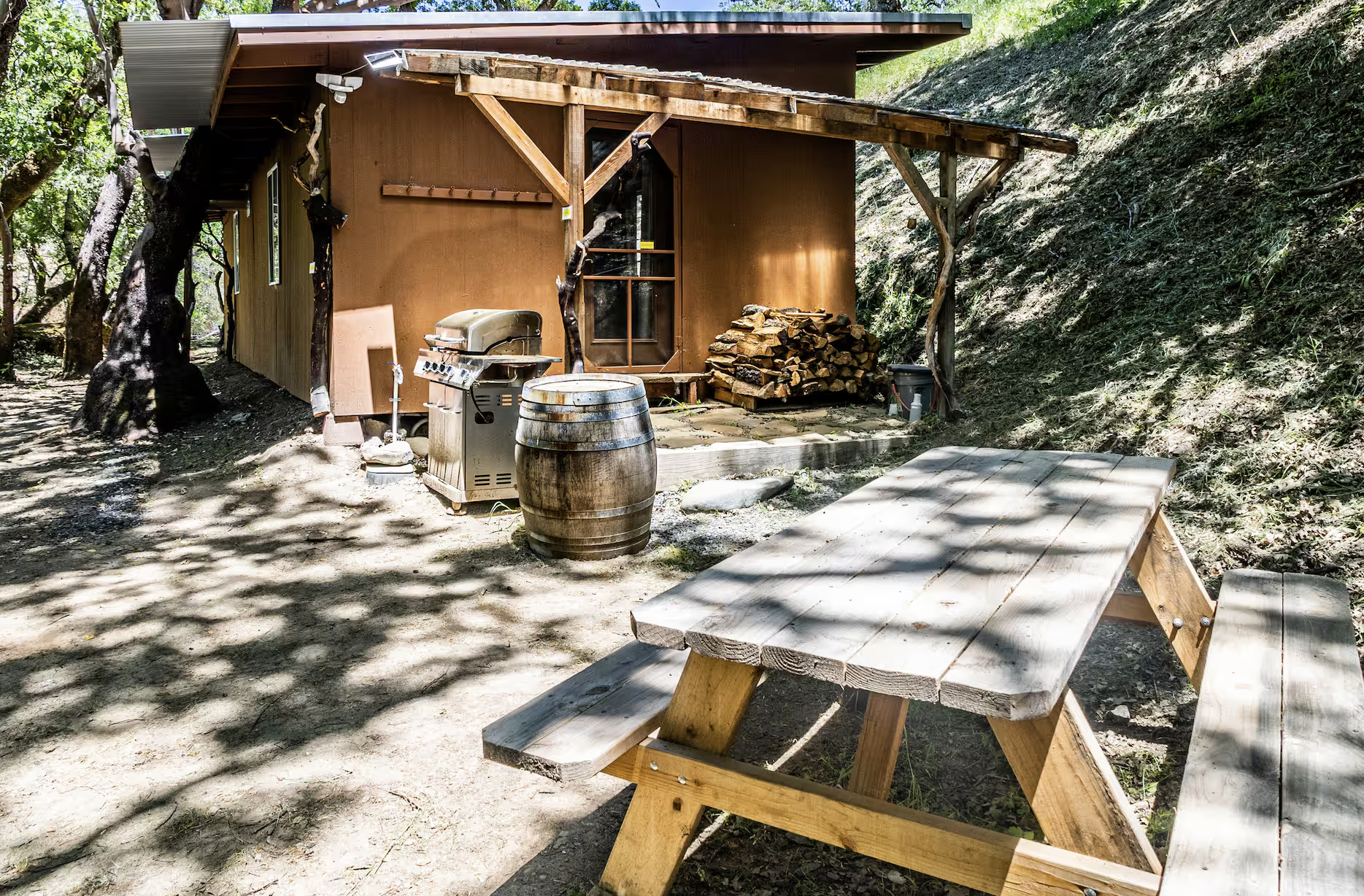 The Cabaña ~ This rustic retreat, once a charming farm building, now awaits you with antique Basque furnishings and rustic charm. Let the symphony of wildlife and the gentle flow of the creek lull you into serenity. 