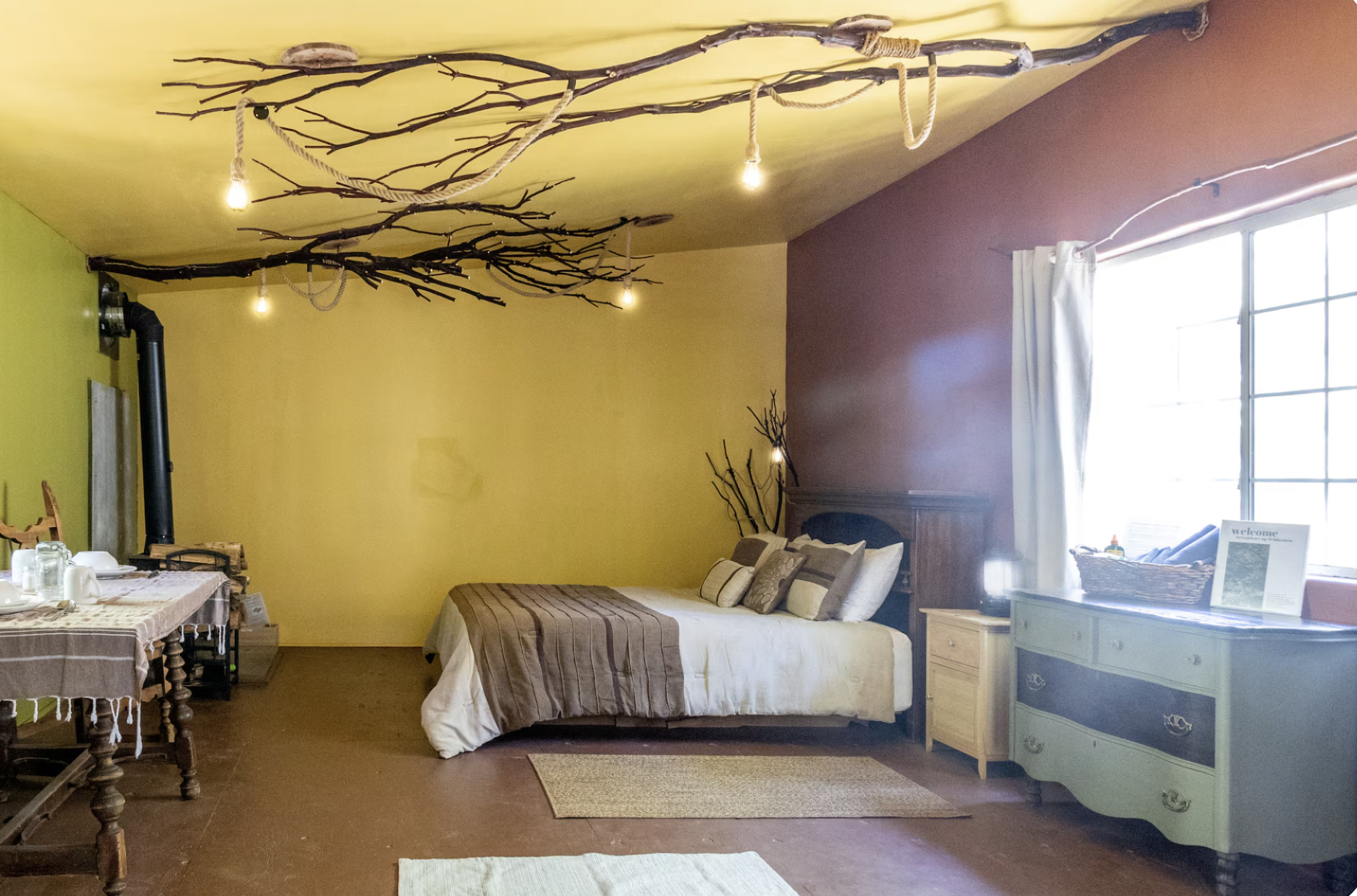 The Cabaña ~ This rustic retreat, once a charming farm building, now awaits you with antique Basque furnishings and rustic charm. Let the symphony of wildlife and the gentle flow of the creek lull you into serenity. 