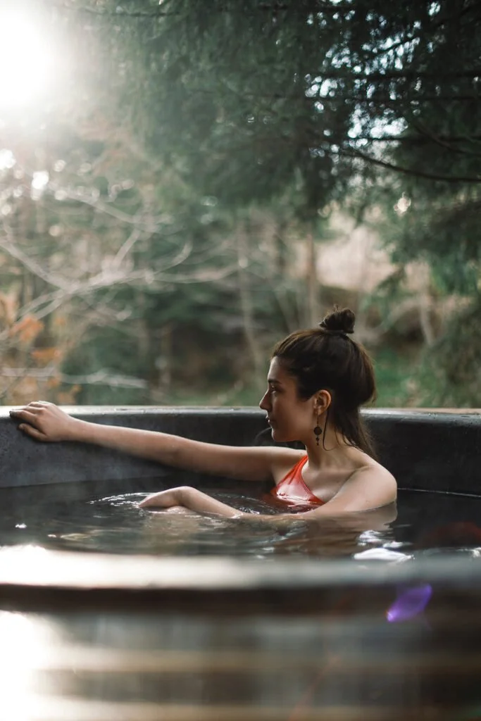 Woman resting and reconnecting with nature during a luxury women’s retreat in Northern California