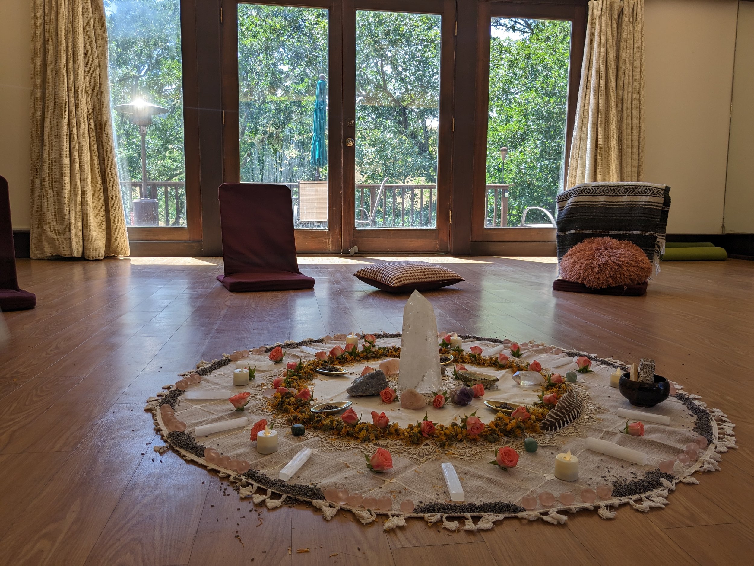 Women journaling and reflecting during a self-discovery workshop at a women’s retreat in California