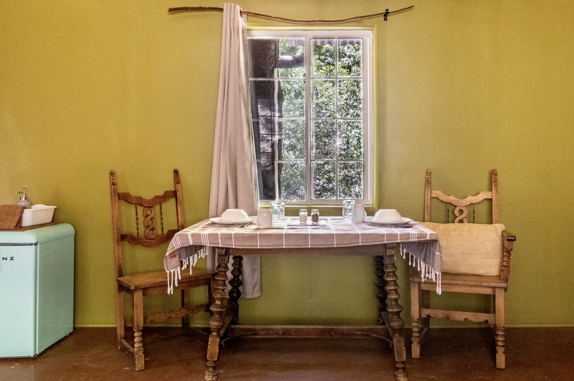 The Cabaña ~ This rustic retreat, once a charming farm building, now awaits you with antique Basque furnishings and rustic charm. Let the symphony of wildlife and the gentle flow of the creek lull you into serenity. 