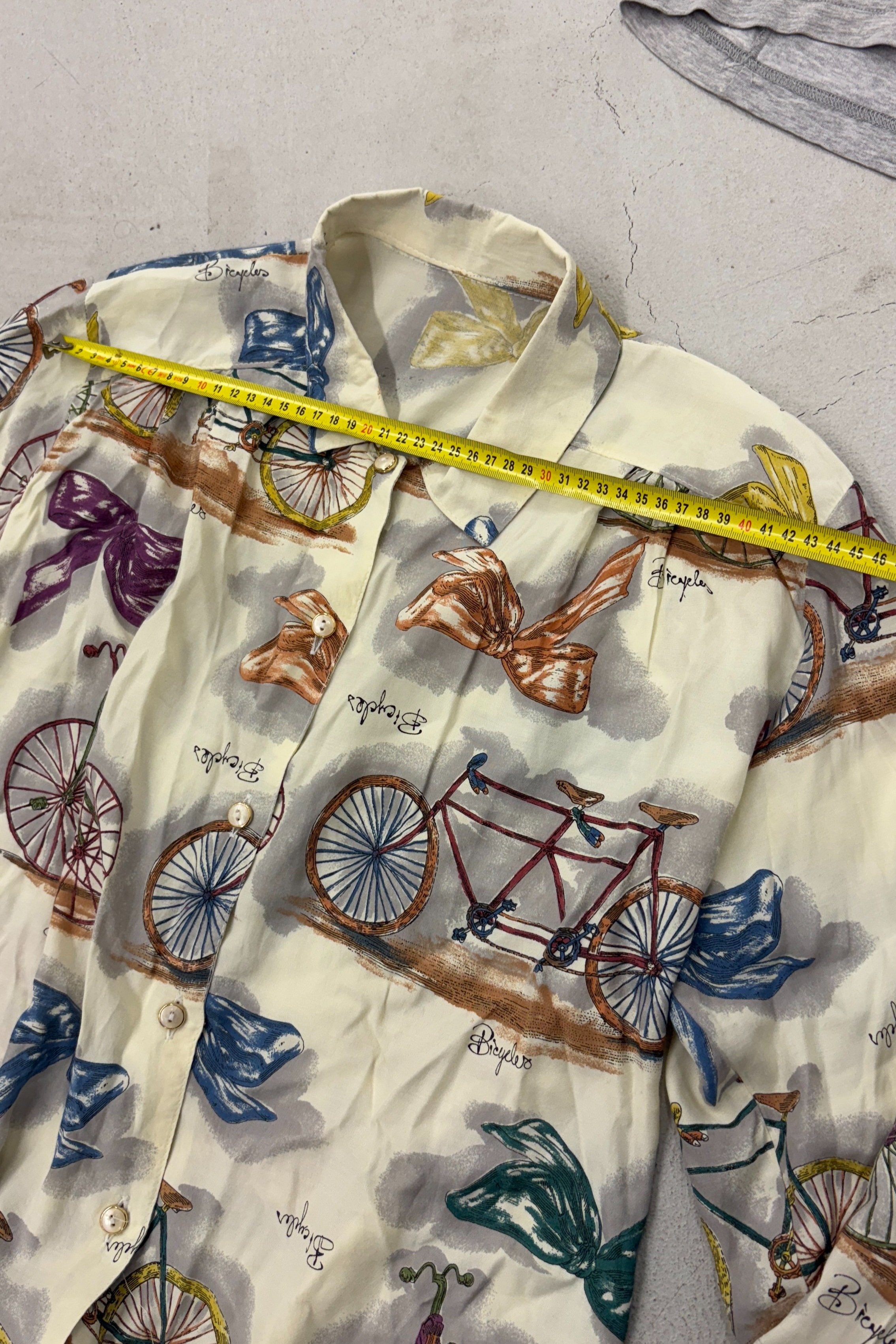 Measurements of a vintage printed Italian button up shirt with bicycle print.