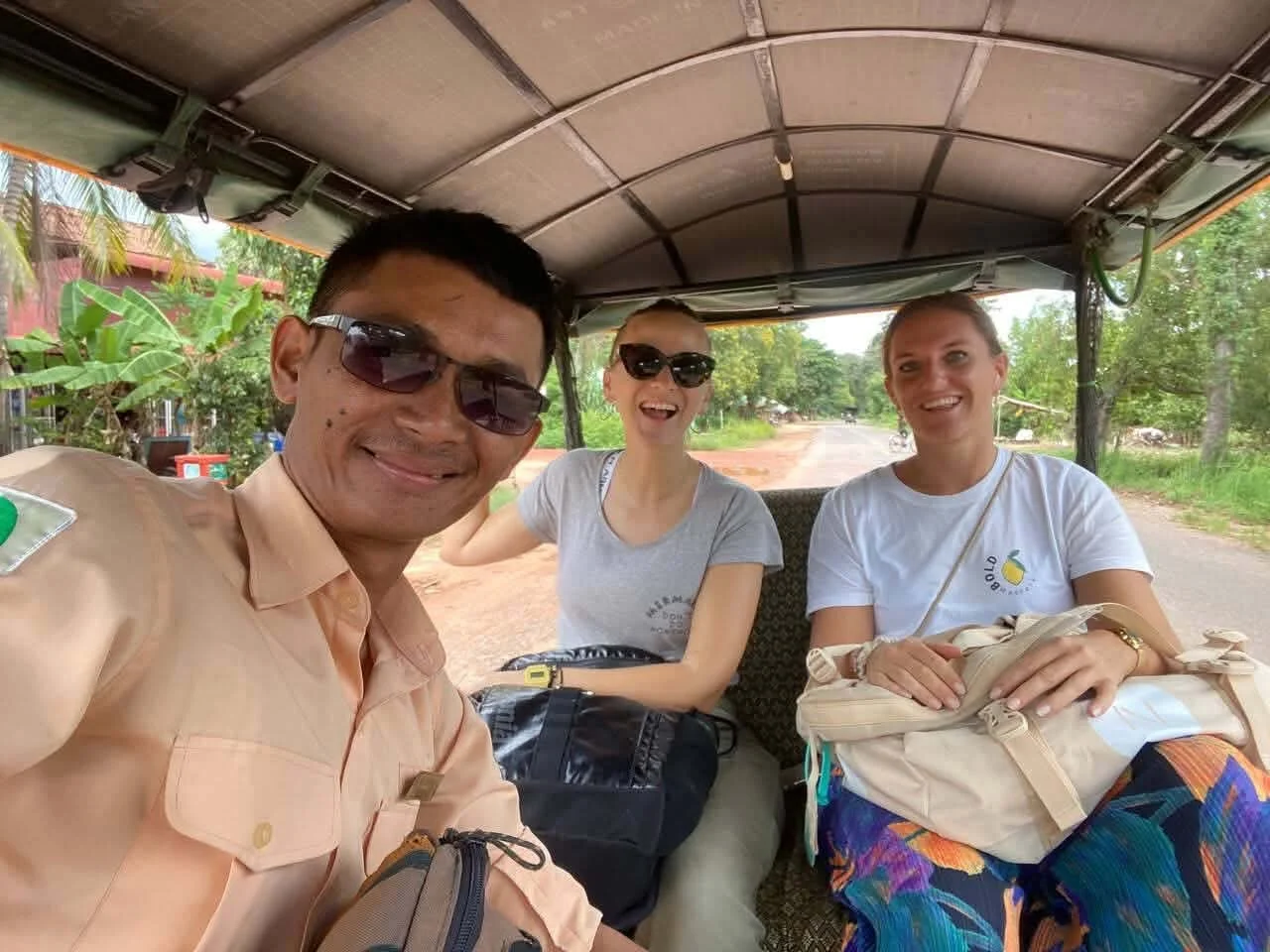 certified guide in a babel tuktuk with guests