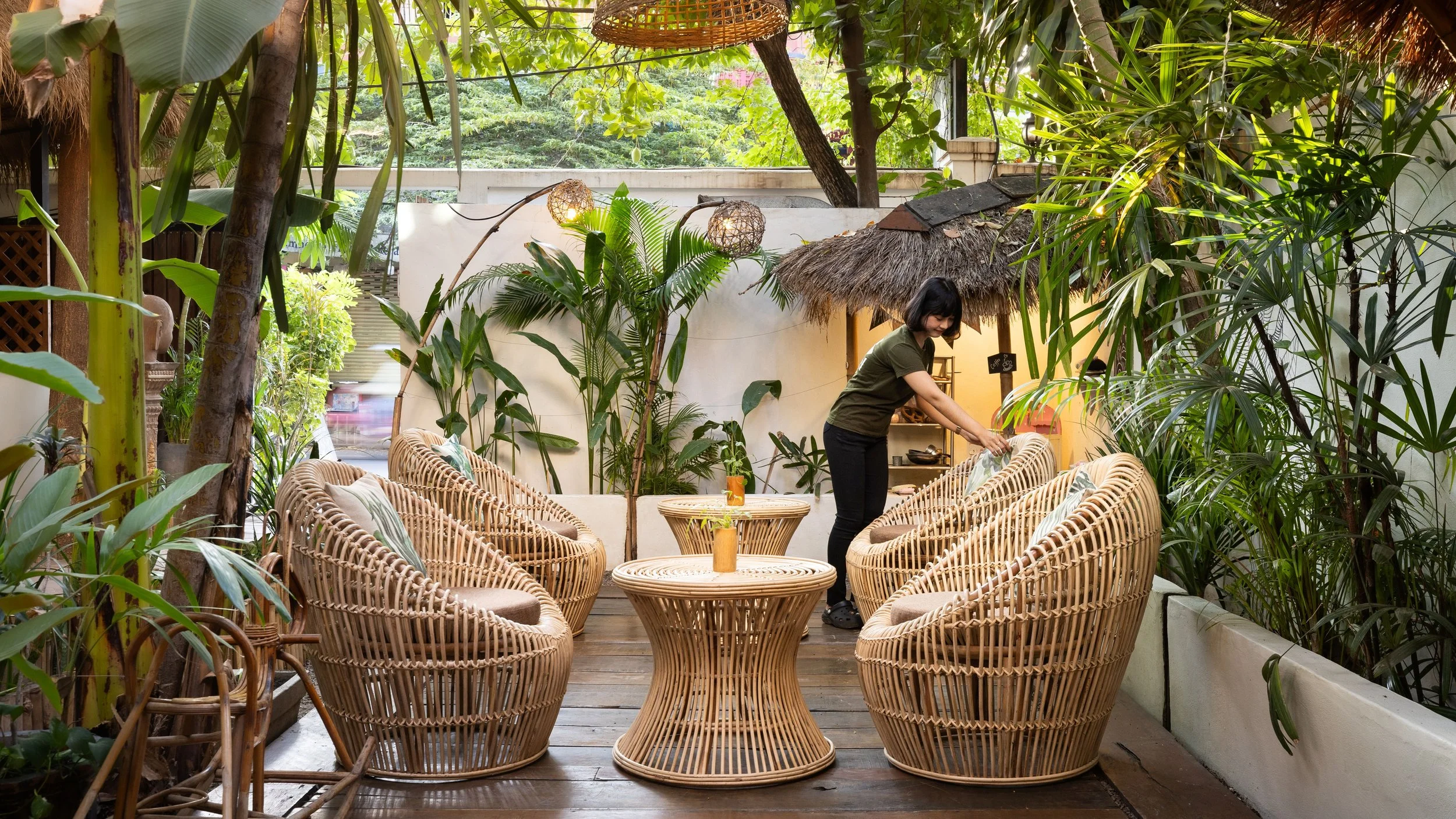 Staff at Babel Guesthouse Siem Reap in the garden restaurant.