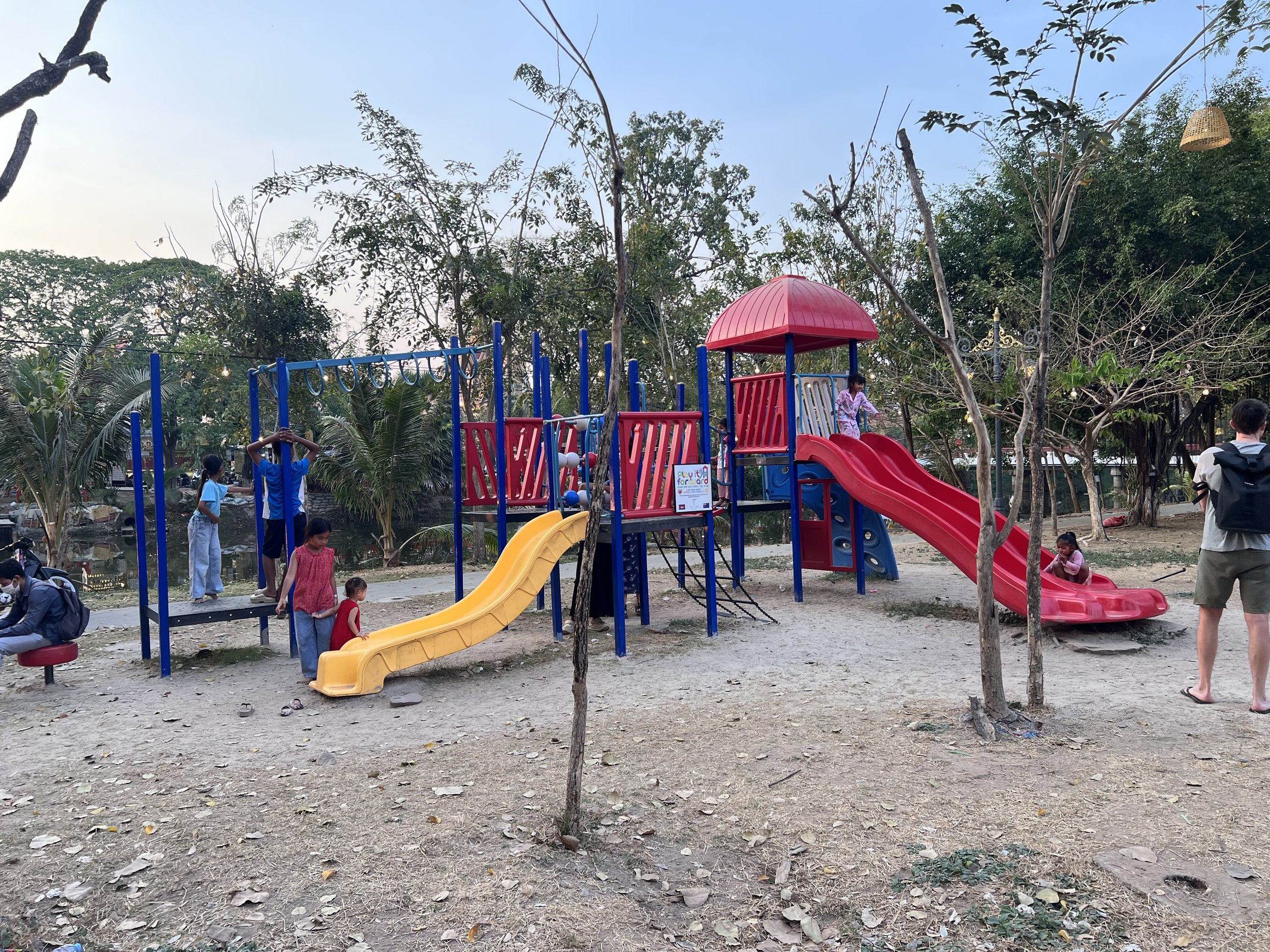 Free public playground at the riverside on Street 26, donated by Heartprint NGO for families in Siem Reap.