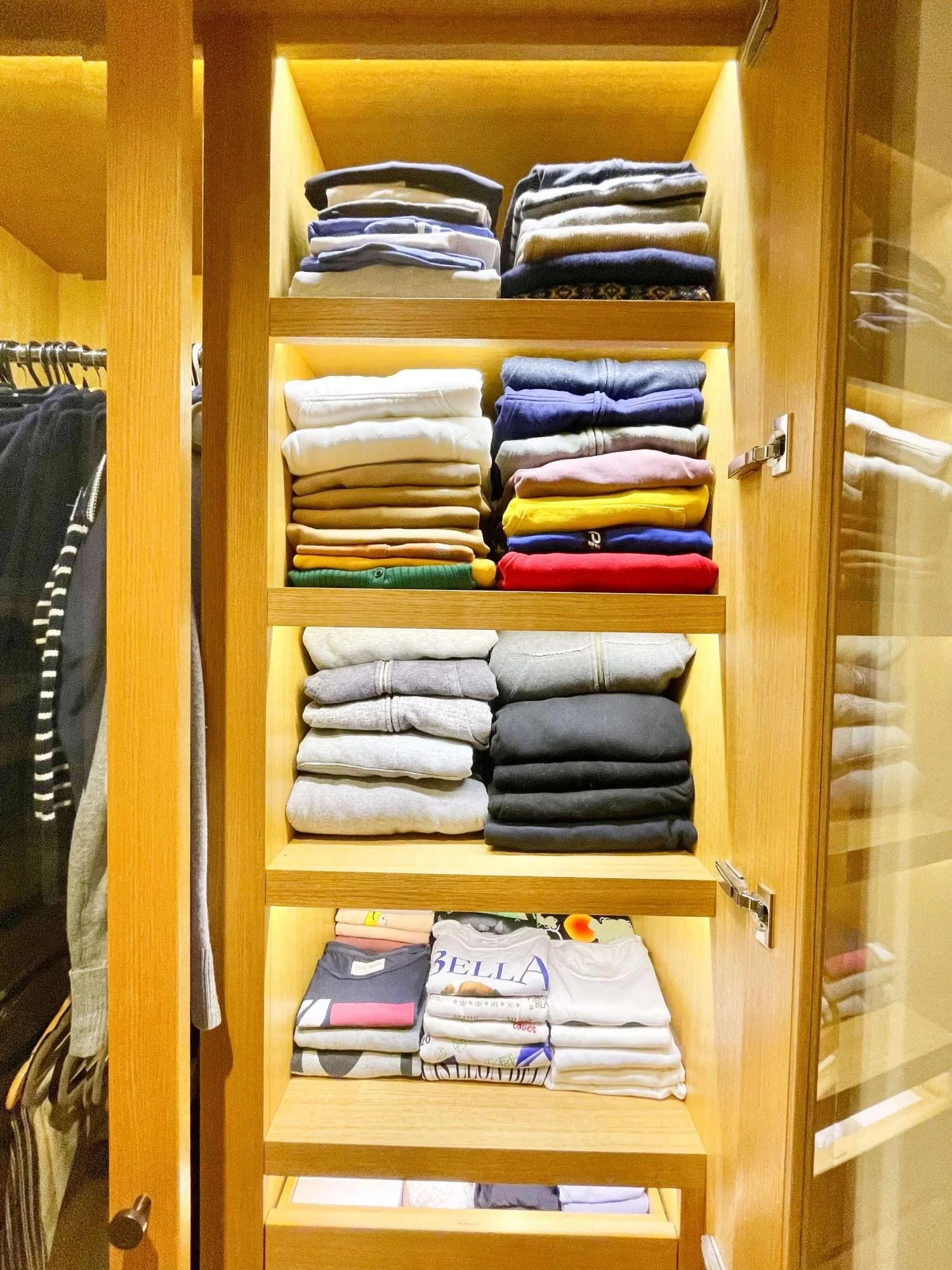 Jumpers file folded to fit perfectly into a narrow wardrobe