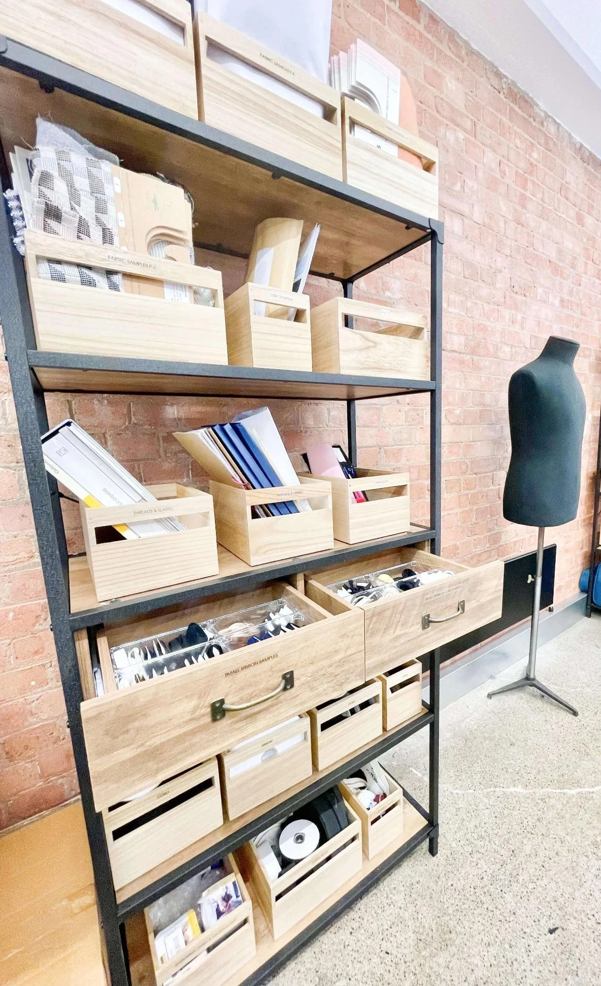 Bamboo bins designed for free standing shelves in a workspace
