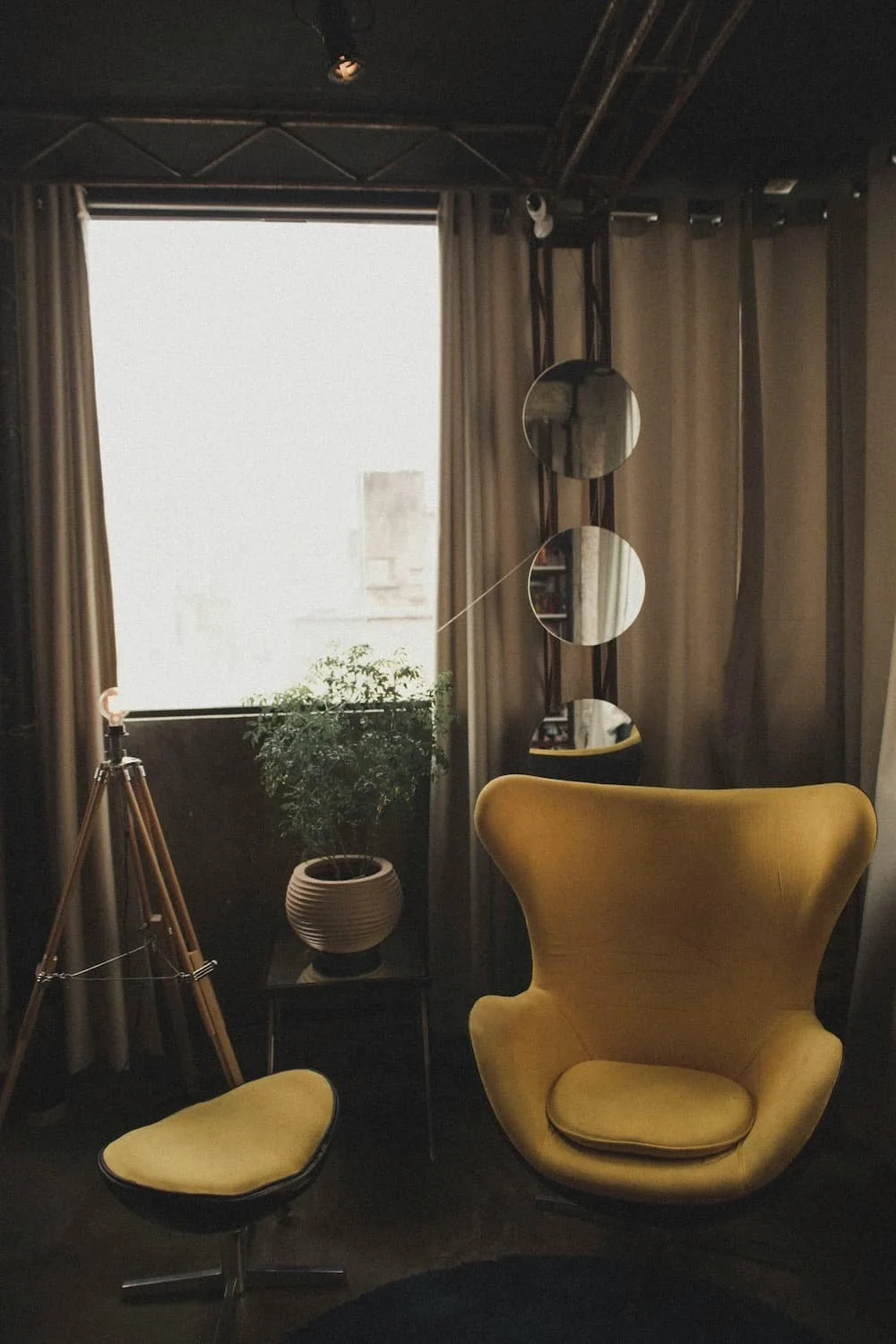 A good example of mirrors being used to make a living room feel bigger