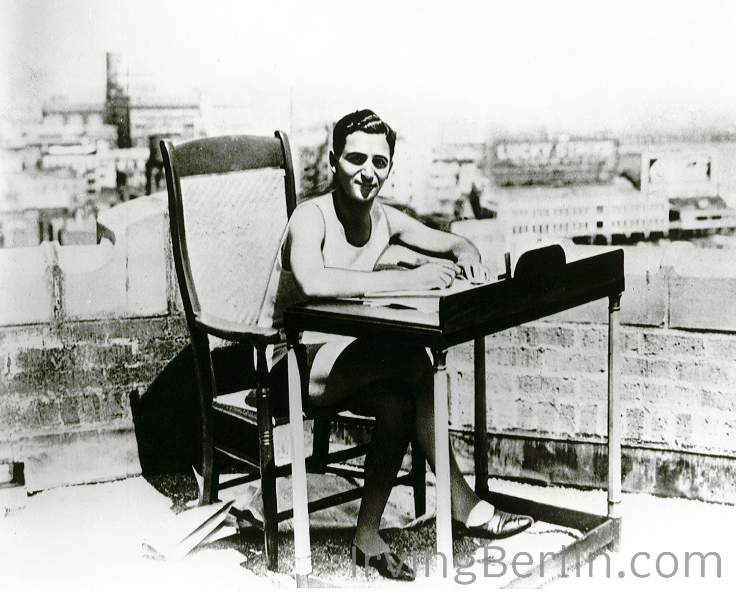 Irving-Berlin-at-desk-on-roof.jpg