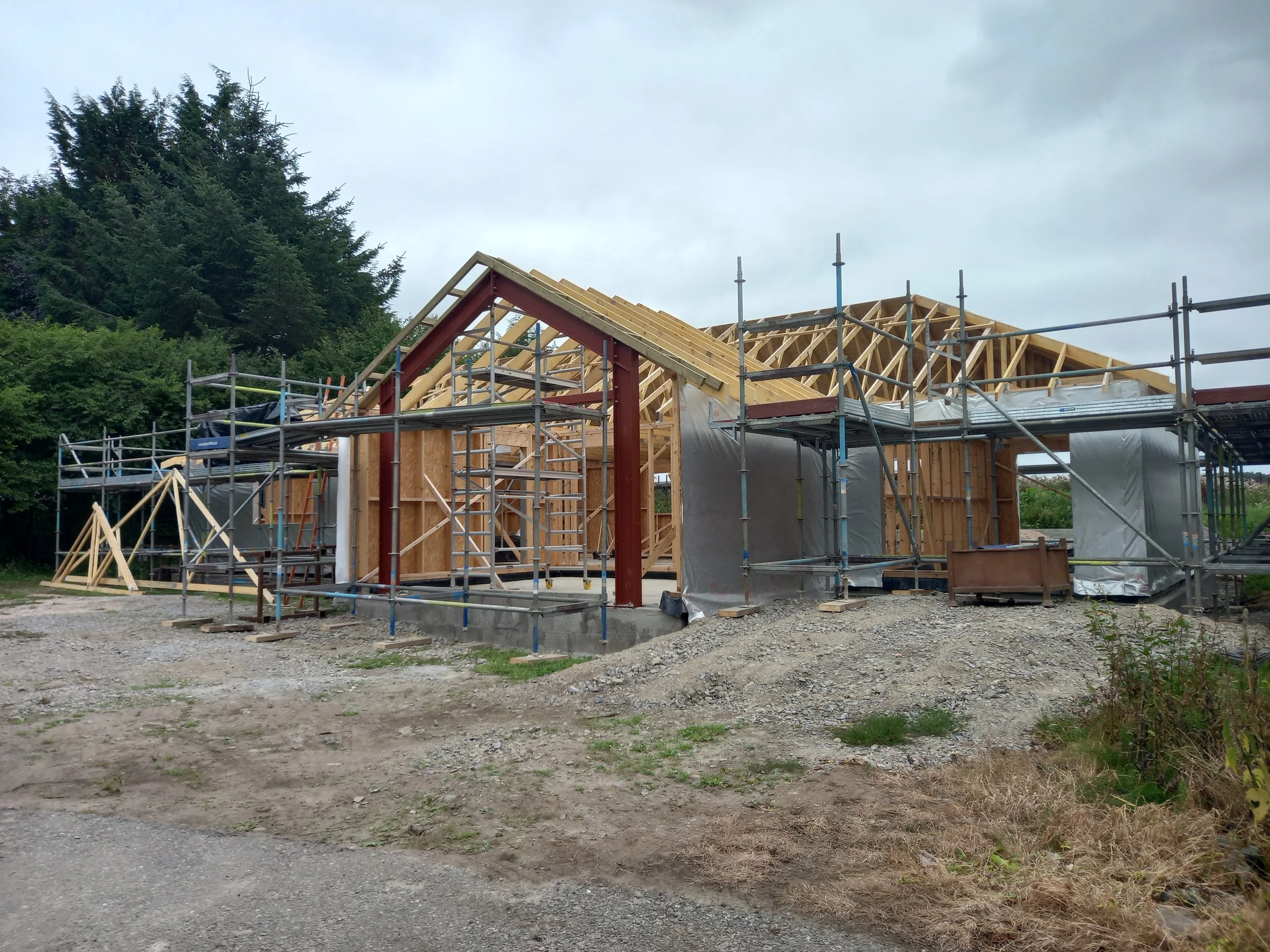 Timber frame of house is erected
