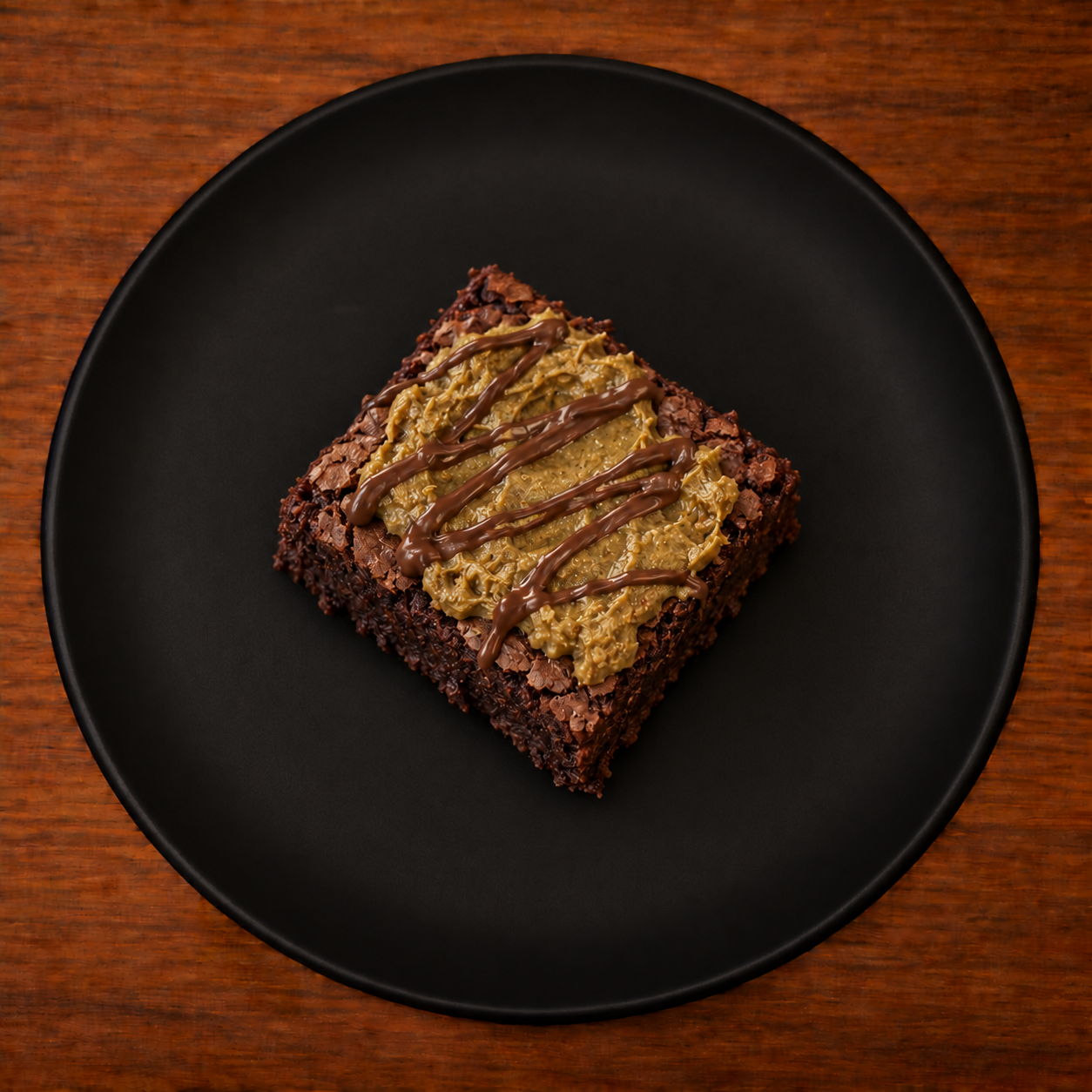 Uniform matte black plate with meal.png