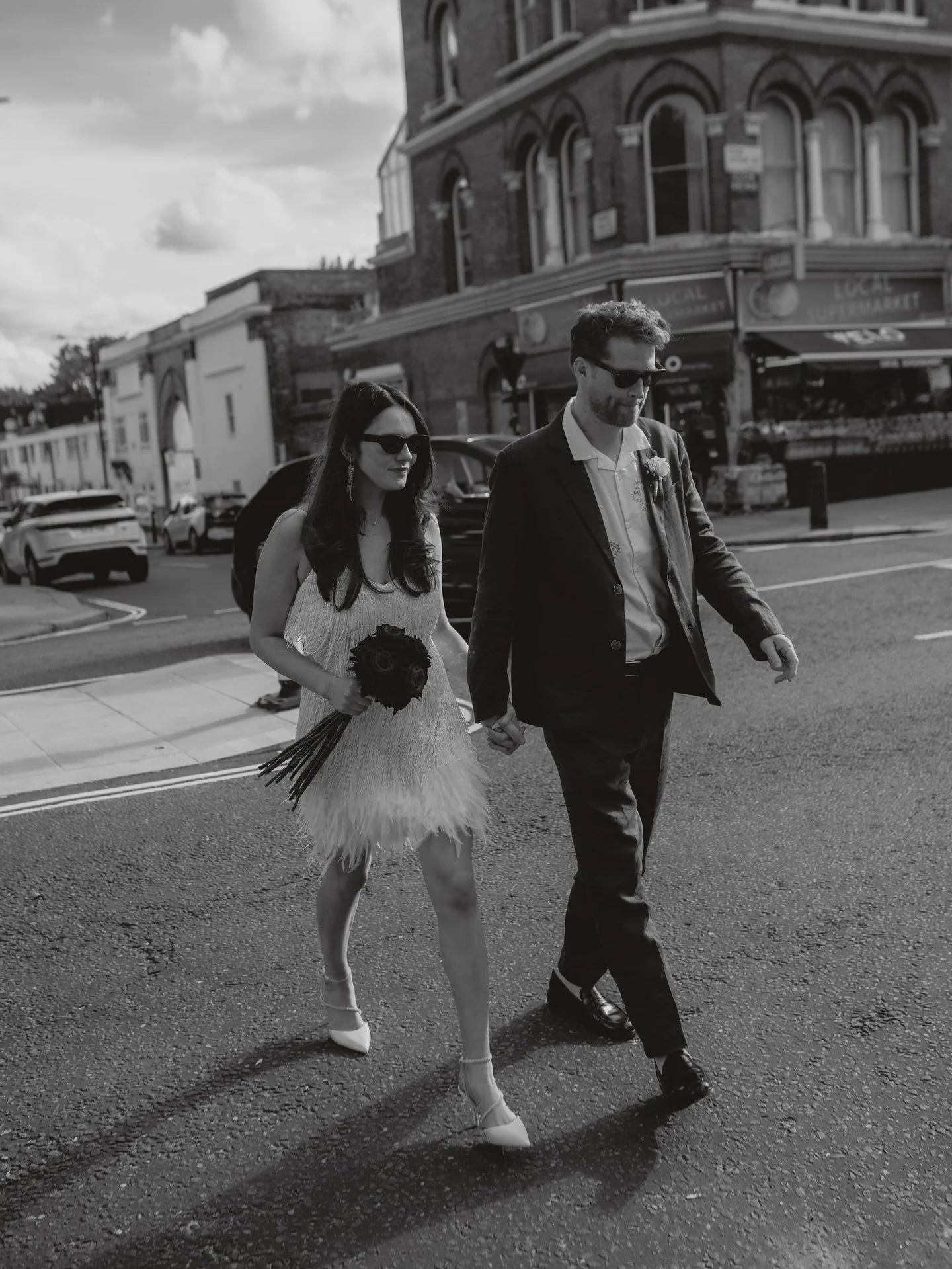 Such a fun day in London with this cool pair 🖤 from a chilled morning at @onehundredshoreditch with Asher, bridesmaids and some family, to a beautiful ceremony at @islington_town_hall_weddings, a very fun bus ride up to @theelginw11 for food, drinks