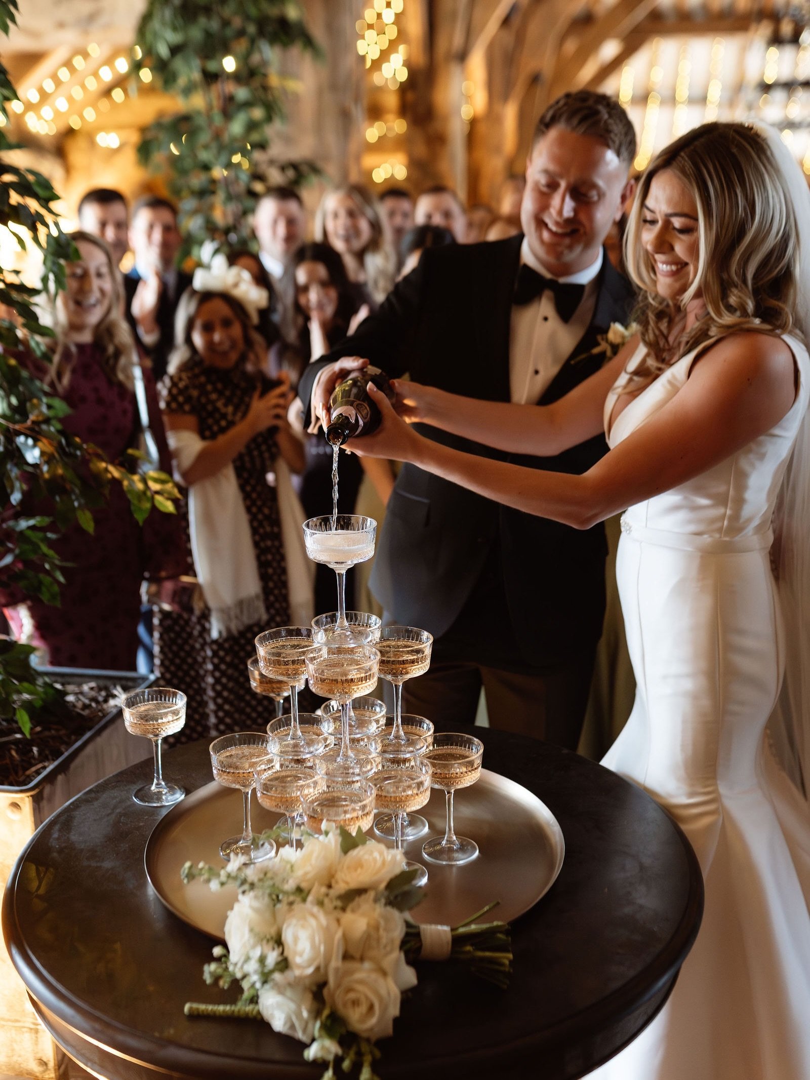 Forever a big fan of a Champagne Tower 🍾🤍 such a fun day working alongside @afilmforever + @jonnyquirk 

@haircreationsbycolette 
@oramakeup 
@jamesalexander_dj 
@thetithebarn 

#ukweddingphotographer #londonweddingphotographer #cotswoldsweddingpho