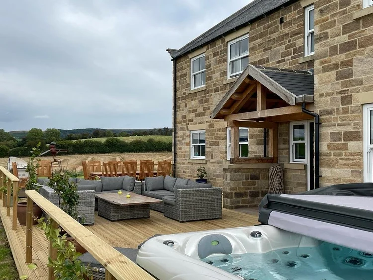Hot tub on decking beside Foxhall Farm