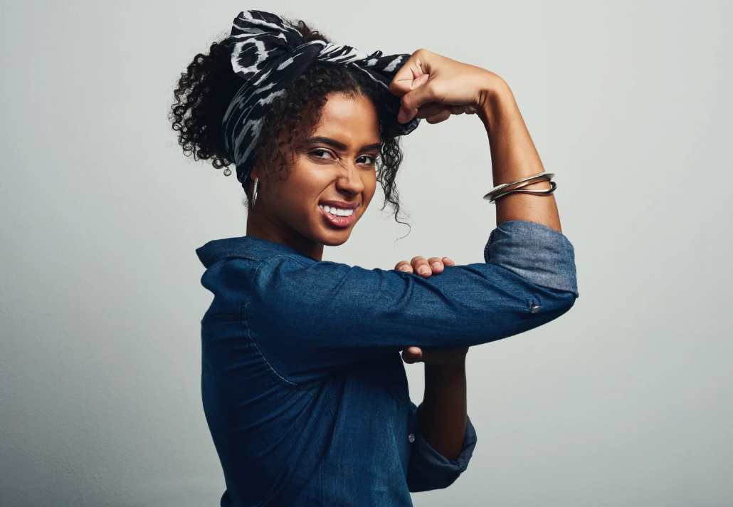Woman showing her muscles